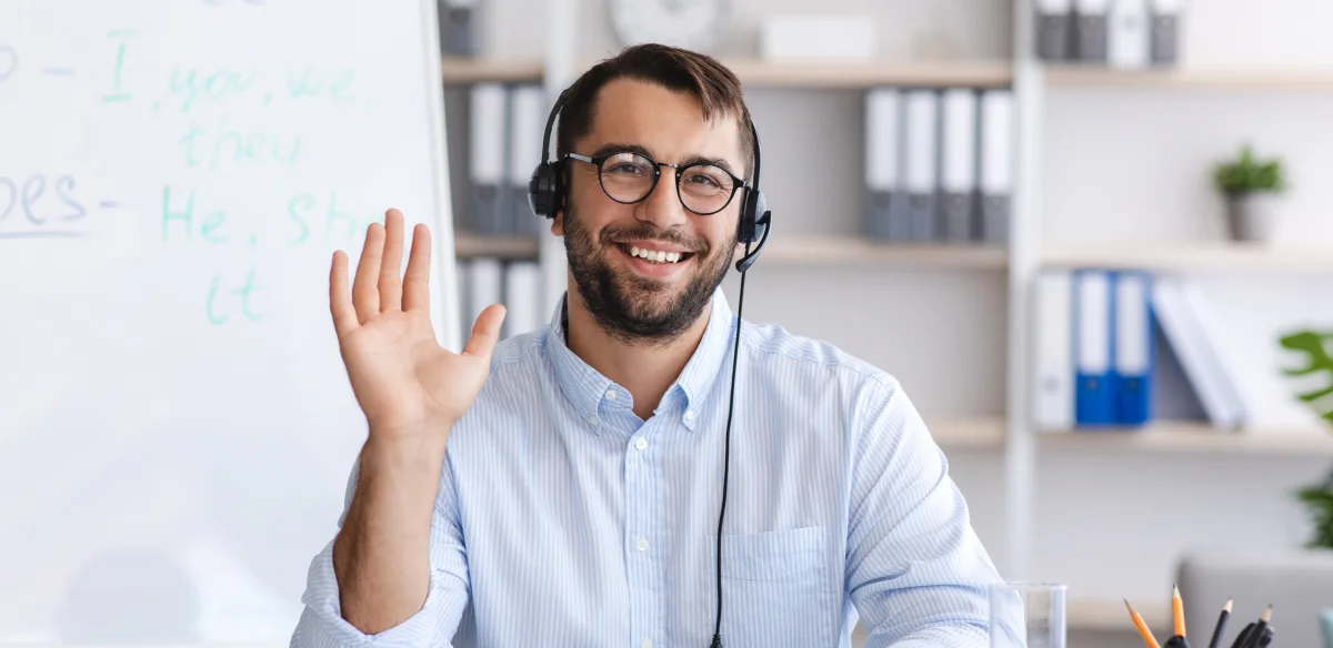 Student wearing a blakc pair of headphones