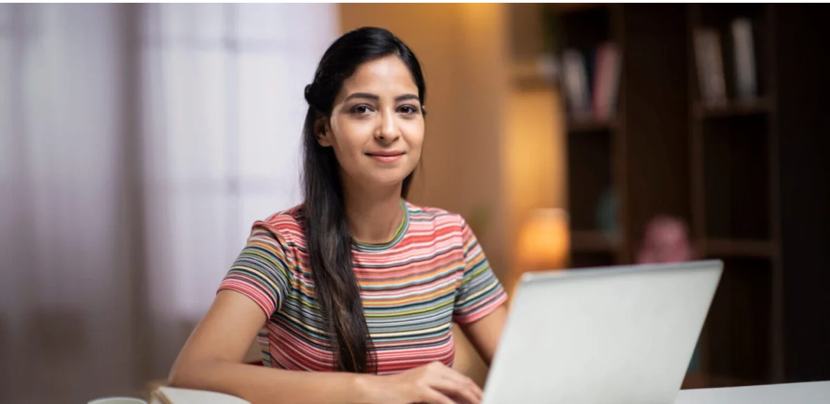 Student working with her laptop