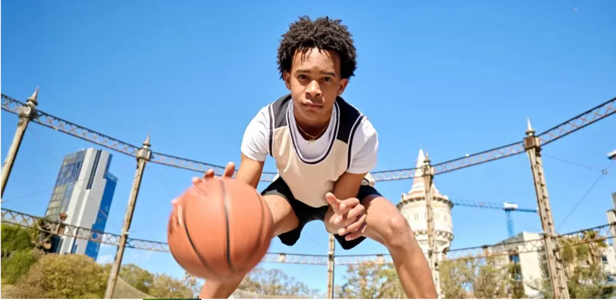 boy playing basketball